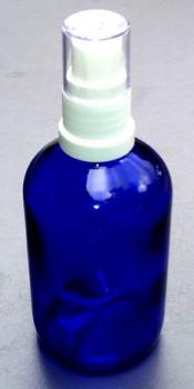 Blauwe glazen fles met pompspruikop